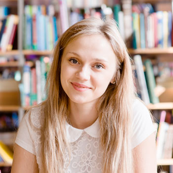 College student studying in a library